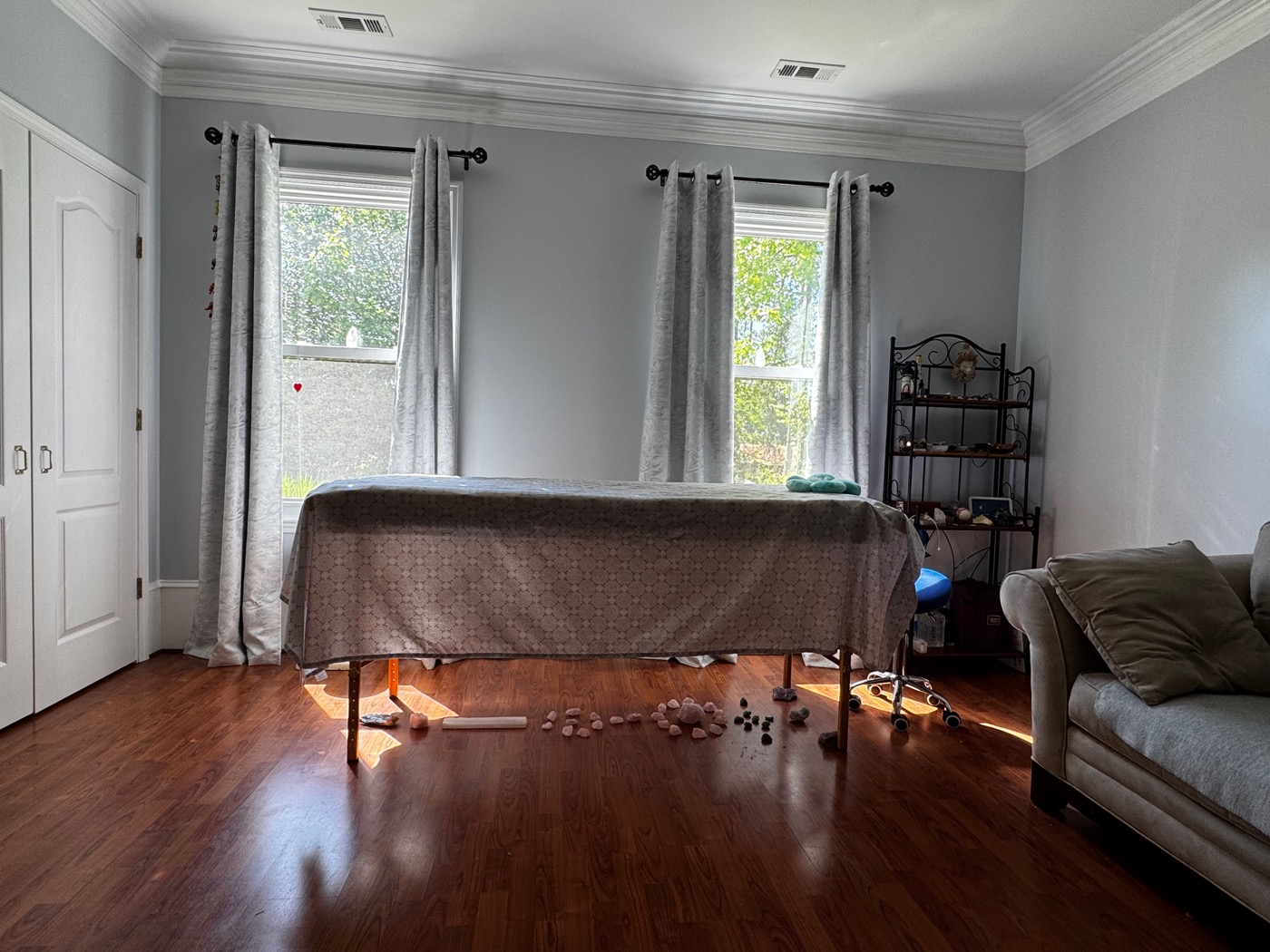 Paulina's treatment room — natural light, treatment table by the windows